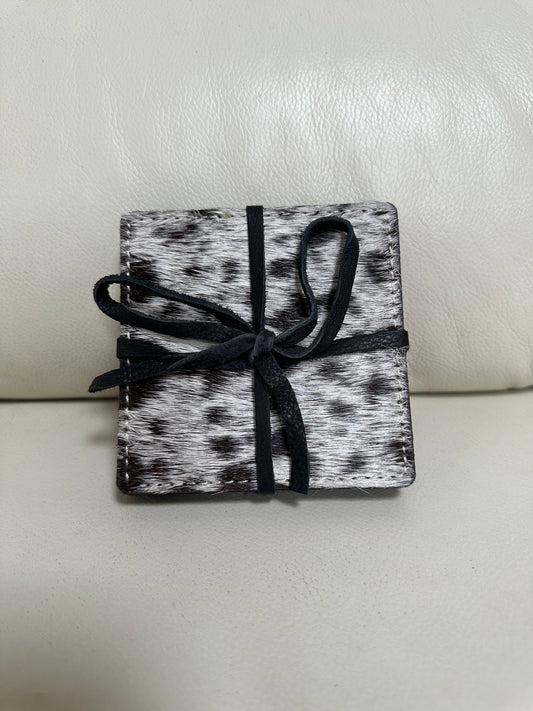 set of 4 cowhide and leather coasters