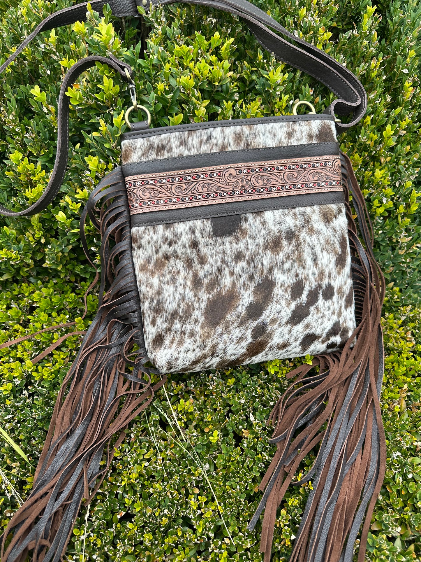 fringed cowhide bag