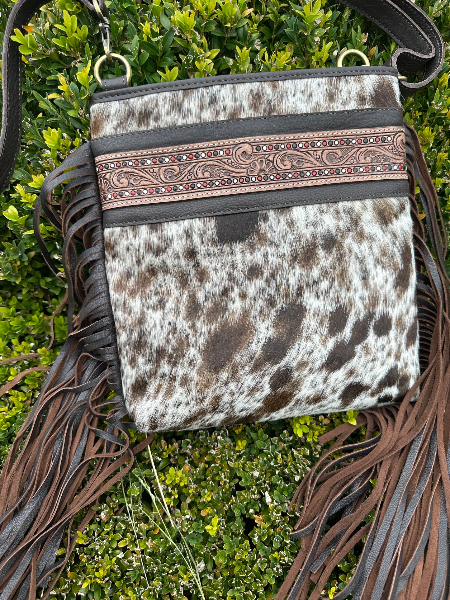 fringed cowhide bag